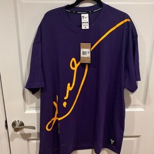 Nike Purple Tee with Gold Graphic